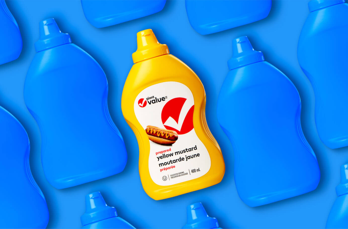 Giant Value yellow mustard bottle on blue background with a blue bottle pattern