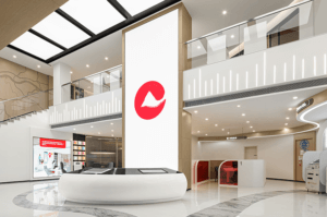 a view in the CQRC bank looking at reception and a two storey digital wall